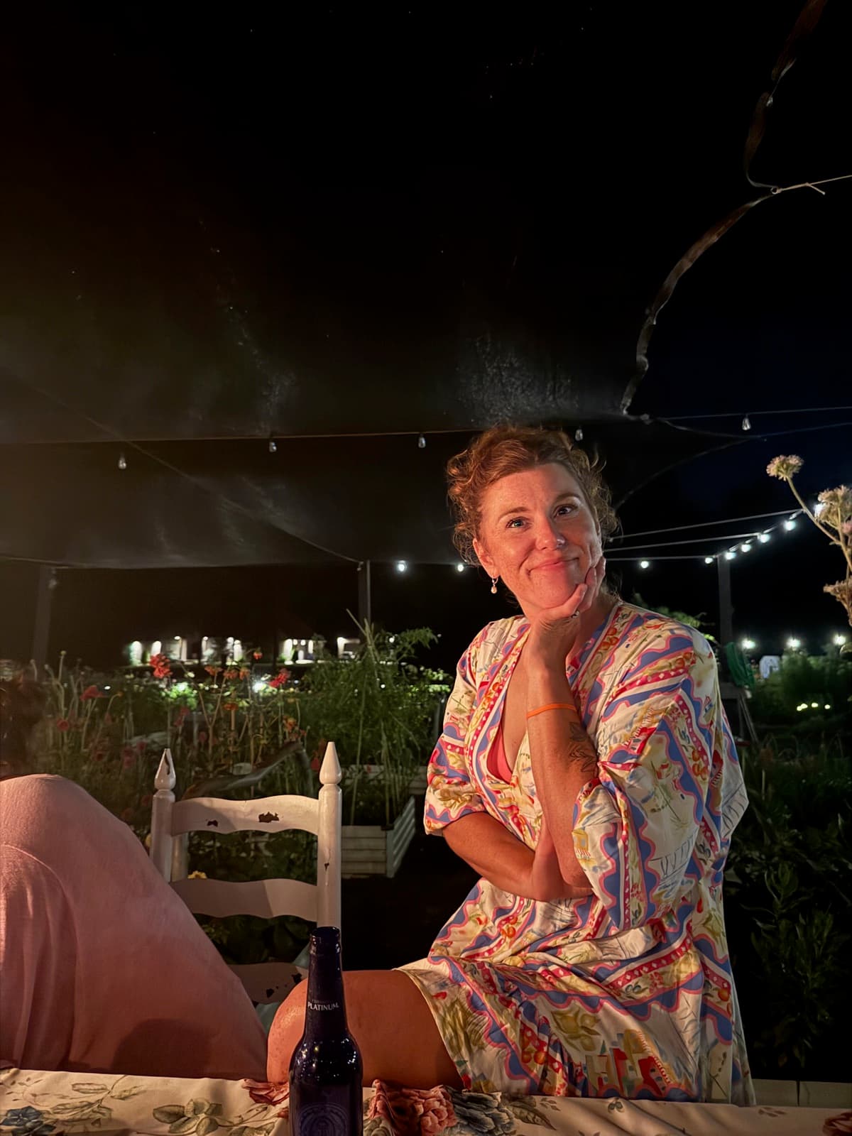 Lauren relaxing in the garden at evening