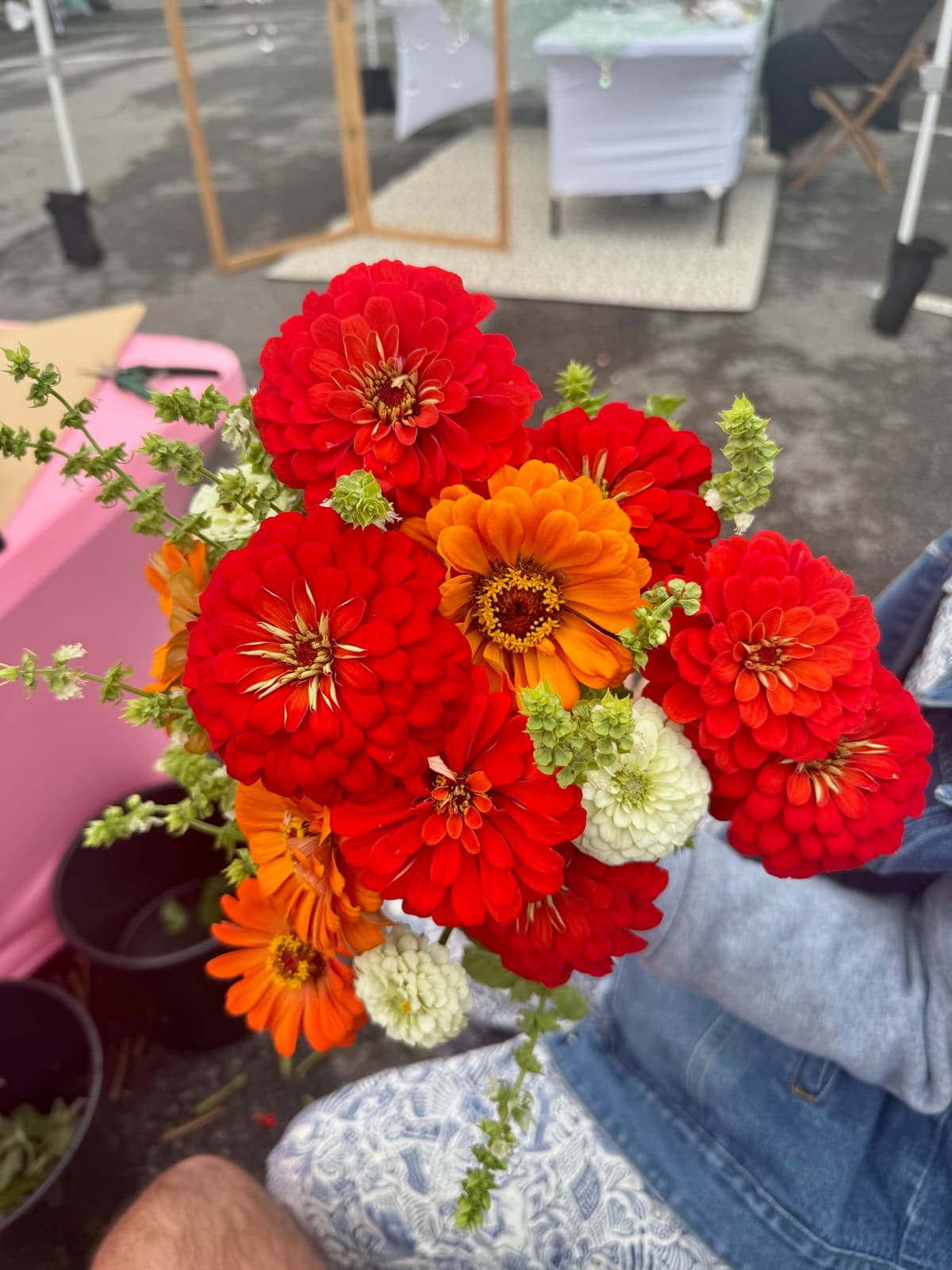 Colorful seasonal bouquet with red and orange zinnias